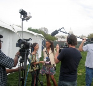 Joy Bryant gives interviews after speaking on the Mall. Photo: Laura Rusu / Oxfam America